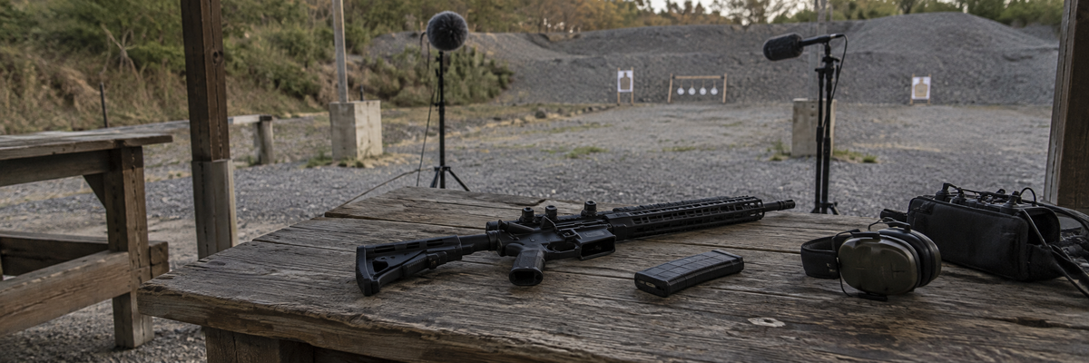 Illustrative firearm recording setup at an empty outdoor range