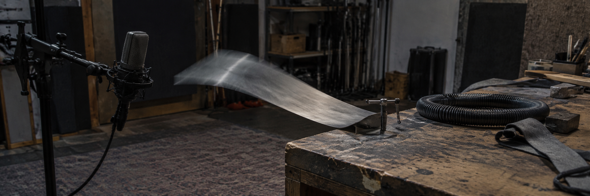 Illustrative movement Foley recording setup with flexible metal and fabric